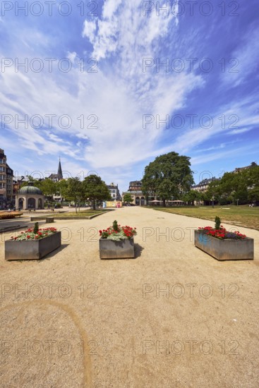 Park, trees, flower pots, plants, lawn, paths, pavilion, general architecture, church tower, blue sky, cumulus clouds, cirrus clouds, Kochbrunnenplatz, Wiesbaden, state capital, district-free city, Hesse, Germany