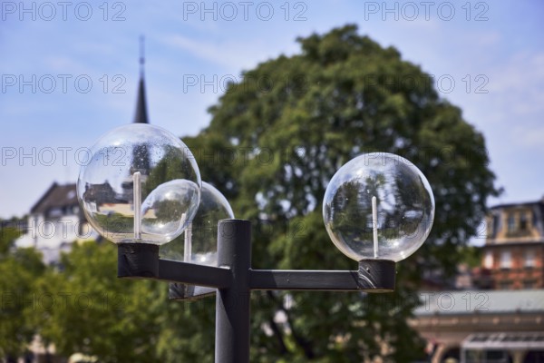 Lantern, church tower, trees, general architecture, depth of focus with blurred background, milky blue sky, diffuse light, Kochbrunnenplatz, Wiesbaden, state capital, district-free city, Hesse, Germany