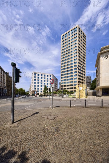 Commercial building, building, high-rise building, general architecture, residential tower, Hessian Ministry of Labor, Integration, Youth and Social Affairs, Apartment Hotel Adina Hotels, lanes, trees, barrier bollards, traffic light, car, vehicles, blue sky, altocumulus clouds, cirrus clouds, intersection between TaunusstraÃŸe, Cansteinsberg, Sonnenberger StraÃŸe and WilhelmstraÃŸe, Wiesbaden, state capital, district-free City, Hesse, Germany