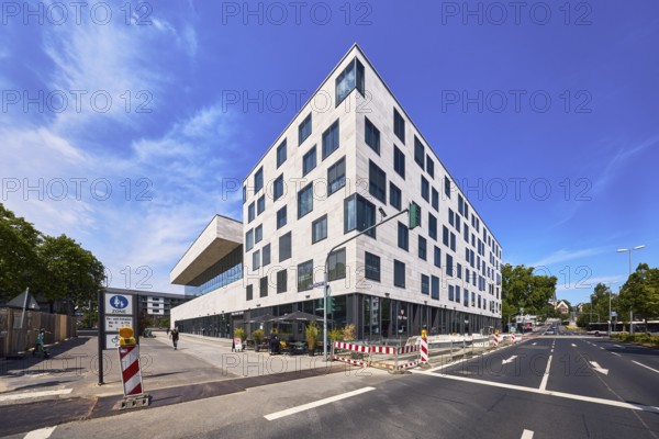 Pedestrian zone, road markings lanes, directional arrows, traffic lights, general architecture, commercial buildings, modern architecture, faÃ§ade with windows, fenced construction site, barrier, road construction, outdoor area of a restaurant, Waffle House, trees, blue sky, cirrus clouds, Schwalbacher StraÃŸe intersection with German Unity Square, Wiesbaden, state capital, district-free city, Hesse, Germany