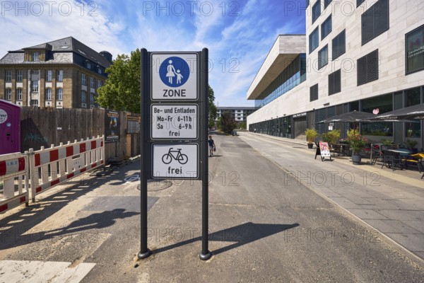 Pedestrian zone, traffic sign pedestrian zone with additional sign loading and unloading free and bicycles free, general architecture, houses, modern buildings, commercial buildings, fenced construction site, road construction, trees, blue sky, altocumulus clouds, cirrus clouds, Platz der Deutschen Einheit, Wiesbaden, state capital, district-free city, Hesse, Germany
