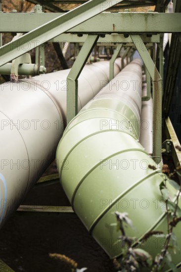 District heating pipeline on the banks of the Wupper, Wuppertal, Germany