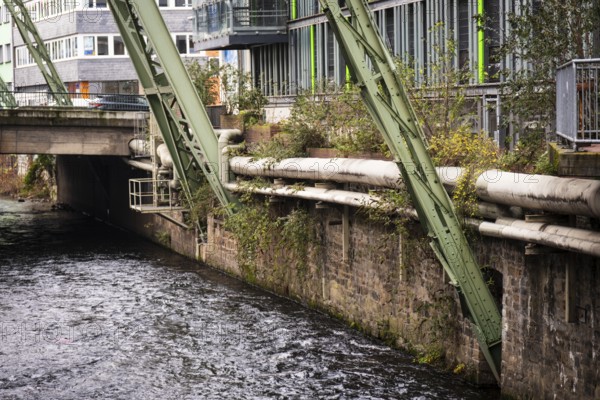 District heating pipeline on the banks of the Wupper, Wuppertal, Germany