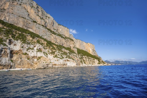 Picturesque rocky coast, cliffs and blue sea, Golfo di Orosei, Baunei, Sardinia, Italy