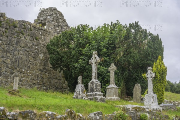 Ruin of a small church and grave crosses, Fore, County Westmeath, Ireland