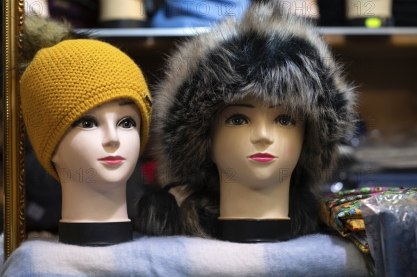 Sales stand for headwear, fur hat, mannequin, head, portrait, Christmas stalls, stalls, Christmas market, blue hour, Stuttgart, Baden-WÃ¼rttemberg, Germany