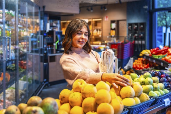 Woman choosing fresh organic produce from a display while shopping for groceries in a modern supermarket, promoting healthy eating and sustainable lifestyle