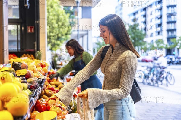 Smiling woman choosing fresh organic fruit and vegetables at an outdoor market stall, embracing a healthy eating lifestyle and sustainable shopping in an urban setting