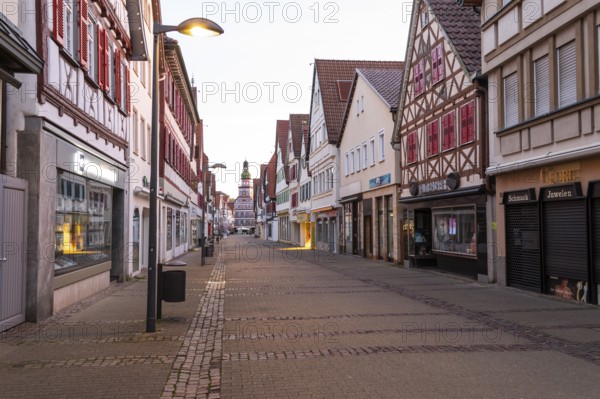 Kirchheim unter Teck, Baden-WÃ¼rttemberg, market street with town hall at sunrise in spring and cherry blossoms