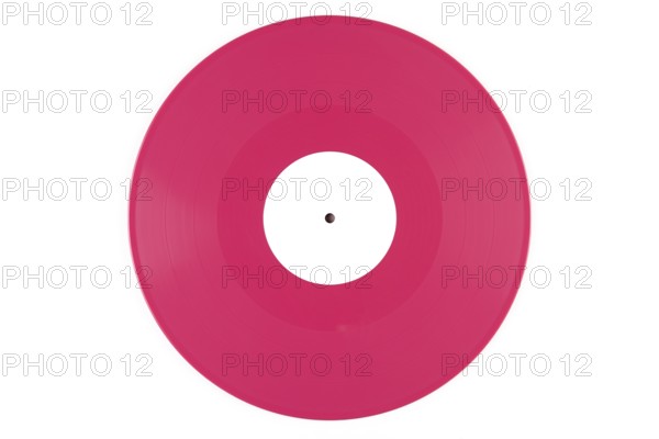 Pink vinyl record with a white label in the middle on a white background