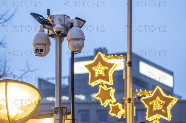 Video surveillance at the Christmas market in downtown Duisburg, KönigstraÃŸe, by a private security company on behalf of the city, the police are notified of relevant events, North Rhine-Westphalia, Germany