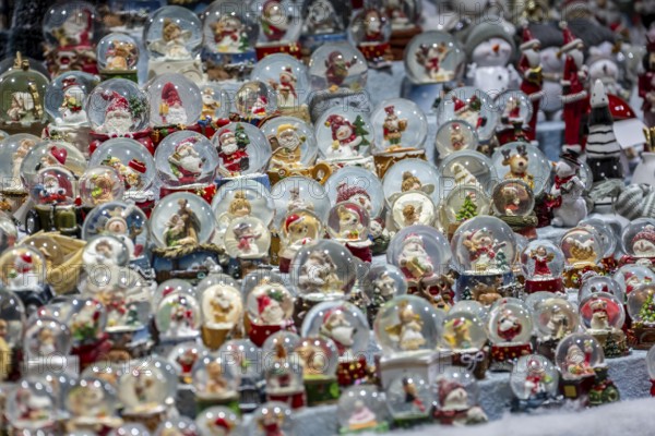 Christmas market, sales stand for decorative items, snow globes with Christmas motifs, North Rhine-Westphalia, Germany