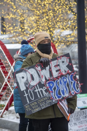 Detroit, Michigan - Residents picket DTE Energy, opposing the electric utility's plan to provide power for a proposed $7 billion data center in rural Michigan. They fear that it could raise residential electricity rates and endanger the water supply