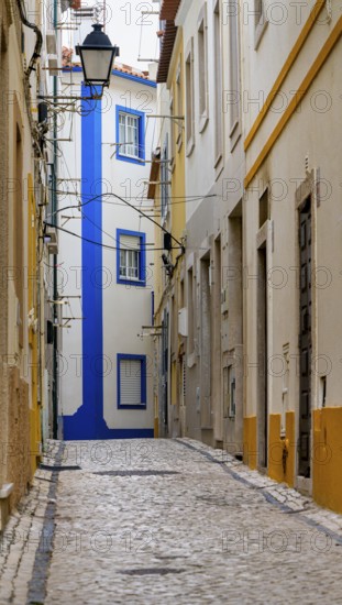 Typical Mediterranean architecture with small narrow streets and streets, Nazare, Portugal