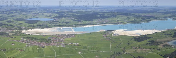 Panorama in spring from Tegelberg, 1881m, of Schwangau, Waltenhofen, Hopfensee and the partly still drained Forggensee, OstallgÃ¤u, Bavaria, Germany