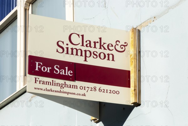 Clarke and Simpson estate agency For Sale sign mounted property wall, Ipswich, Suffolk, England, UK