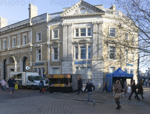 Barclays Bank building food stalls Princes street pedestrianised area, town centre of Ipswich, Suffolk, England, UK