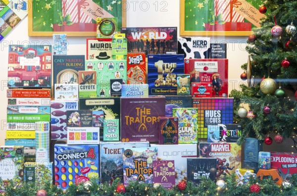 Boardgames in window display of Waterstones bookshop, Ipswich, Suffolk, England, UK