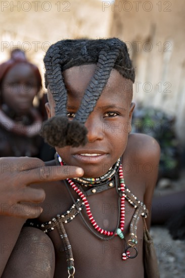 Portrait, Himba girl, traditional Himba village, Kaokoveld, Kunene, Namibia