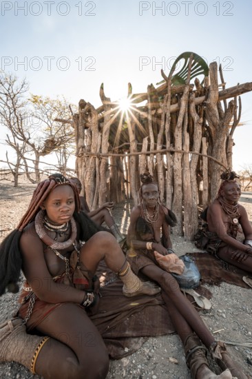 Old and young woman, Himba woman, traditional Himba village, Kaokoveld, Kunene, Namibia