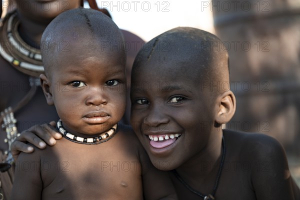 Funny Himba kids, traditional Himba village, Kaokoveld, Kunene, Namibia
