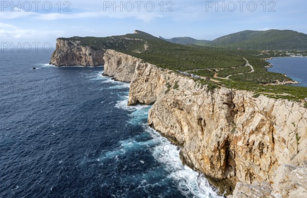 View of steep cliffs by the sea, coastal landscape, cliffs on the Capo Caccia headland, Alghero, Sardinia, Italy