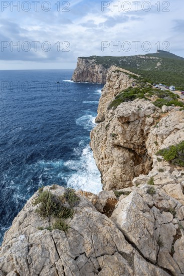 Steep cliffs by the sea, Belvedere Foradada, cliffs on the Capo Caccia headland, Alghero, Sardinia, Italy