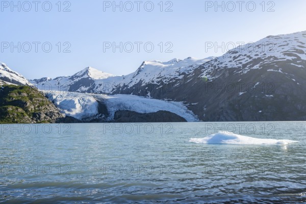 Snowy mountains and glaciers Portage Glacier on Portage Lake glacial lake, Chugach National Forest, Alaska, USA