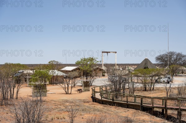 Office for former killing of elephants to combat overpopulations, Olifantsrus Camp, Waterhole, Etosha National Park, Namibia