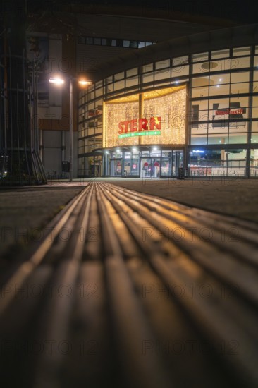 Entrance area of a Stern Center shopping center at night, festively illuminated, Sindelfingen, Böblingen district, Germany