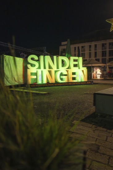 Night view of Christmassy signs in an urban area, Sindelfingen, Böblingen district, Germany