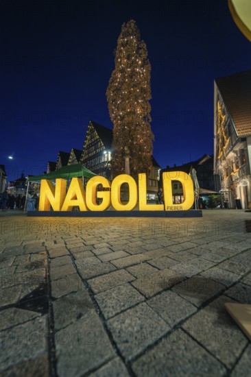 Glowing Nagold lettering at night in the atmospheric city center, Christmas market 2025, Nagold, Black Forest, Calw district, Germany