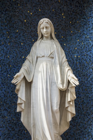 Marble Madonna in front of a blue mosaic, Wissembourg, Weissenburg, Alsace, Bas-Rhin department, France