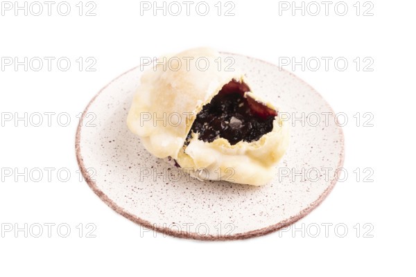 Glazed Pies with blueberry jam Isolated on white background, side view, close up