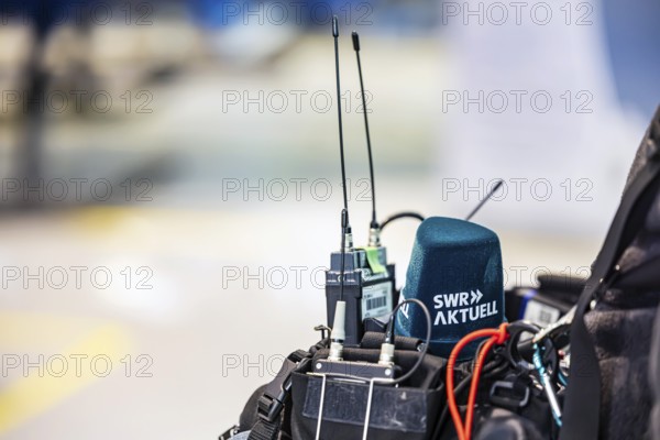 Symbolic photo media. Microphone of a SÃ¼dwestrunfunk reporter from the SWR Aktuell editorial team with logo. Stuttgart, Baden-WÃ¼rttemberg, Germany
