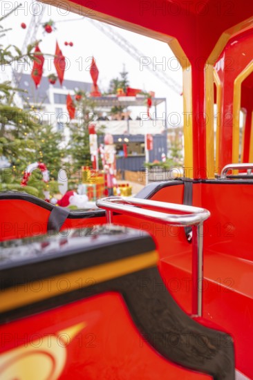 Interior of a red toy car decorated for the Christmas market, Sindelfingen, Böblingen district, Germany