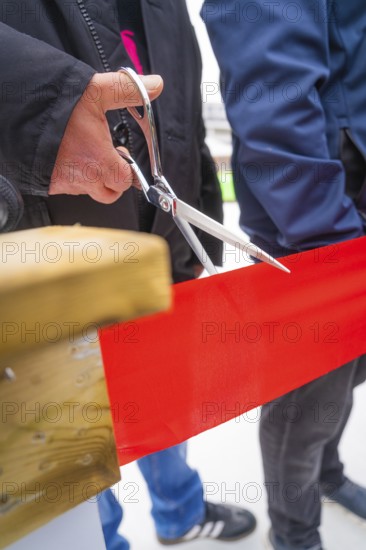 Opening scene with scissors cutting through a red ribbon, Sindelfingen, Böblingen district, Germany