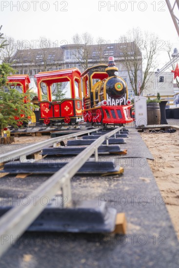 Toy train on rails creates cheerful atmosphere at Christmas market, Sindelfingen, Böblingen district, Germany