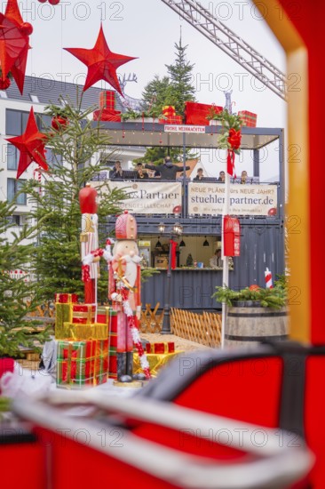 View of Christmas decoration with big red stars and gifts, Sindelfingen, Böblingen district, Germany