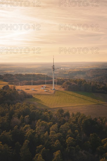 Radio mast overlooking a vast and quiet landscape, in soft evening light, Gechingen, Hecken and GÃ¤u region, Calw district, Germany