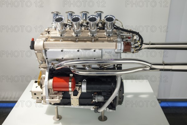 An M10 SOHC in-line four-cylinder petrol engine from car manufacturer BMW, on display at the BMW Museum Munich, Bavaria Germany