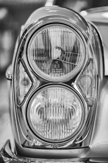 Detailed view, black and white photography, twin headlights for various classic Mercedes-Benz models, manufactured by Bosch. It was used in vehicles of the W108, W109, W111 and W112 series, which were produced from the 1960s to the early 1970s, Stuttgart, Baden-WÃ¼rttemberg, Germany