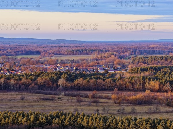 Mixed autumn forest in the evening near LÃ¼bben in the Dahme-Spreewald district in Lower Lusatia. Spreewald UNESCO Biosphere Reserve. aerial view. LÃ¼bben, Brandenburg, Germany