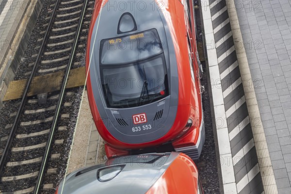 Ulm main station with Deutsche Bahn AG regional train on the platform. Ulm, Baden-WÃ¼rttemberg, Germany