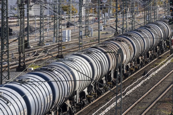 Freight train with tank car traveling through UntertÃ¼rkheim, Stuttgart, Baden-WÃ¼rttemberg, Germany