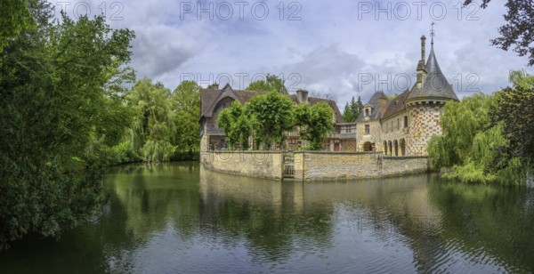 Castle surrounded by a moat in Saint-Germain-de-Livet, Calvados Department, France