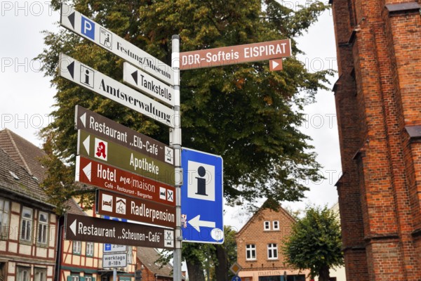 Various signs for tourists and cyclists on Elberadweg, tourist information, hotel, restaurant, Dömitz, Hamburg metropolitan region, Ludwigslust-Parchim, Mecklenburg-Western Pomerania, Germany
