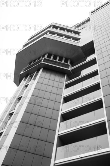 Modern architecture, geometric lines photographed in black and white, former water tower of the Radolfzell dairy plant, converted into the Hotel Aqua-Turm since 2017. The world's first zero-energy passive high-rise building, the entire faÃ§ade consists of around 1000 photovoltaic modules and uses solar thermal wind power and hydrothermal energy to produce more energy than it consumes, Konstanz district, Baden-WÃ¼rttemberg, Germany