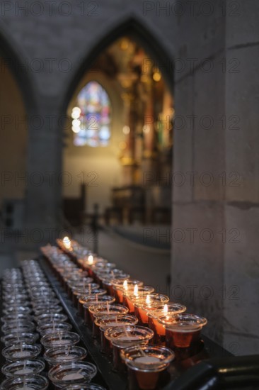Burning candles in Radolfzell MÃ¼nster, which create a peaceful and spiritual atmosphere, Radolfzell am Lake Constance, district of Konstanz, Baden-WÃ¼rttemberg, Germany
