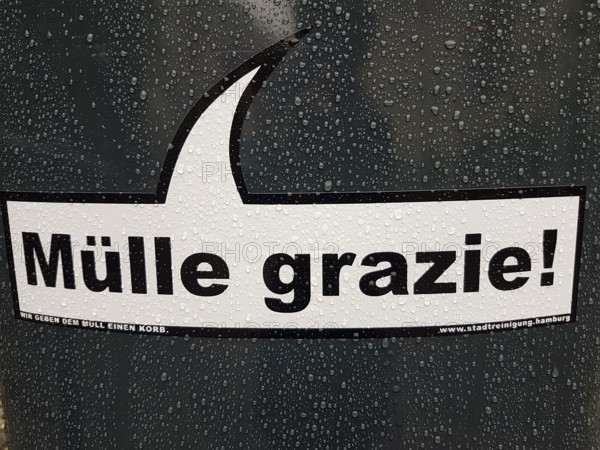 Funny sticker with inscription on a trash can, MÃ¼lle grazie, We give the trash a basket, Stadtreinigung, Hamburg, Germany